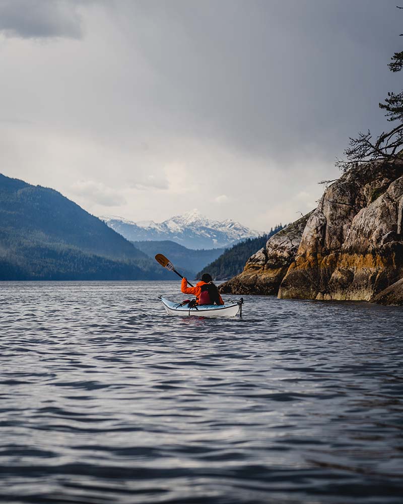 Errin's friend kayaking in the ocean