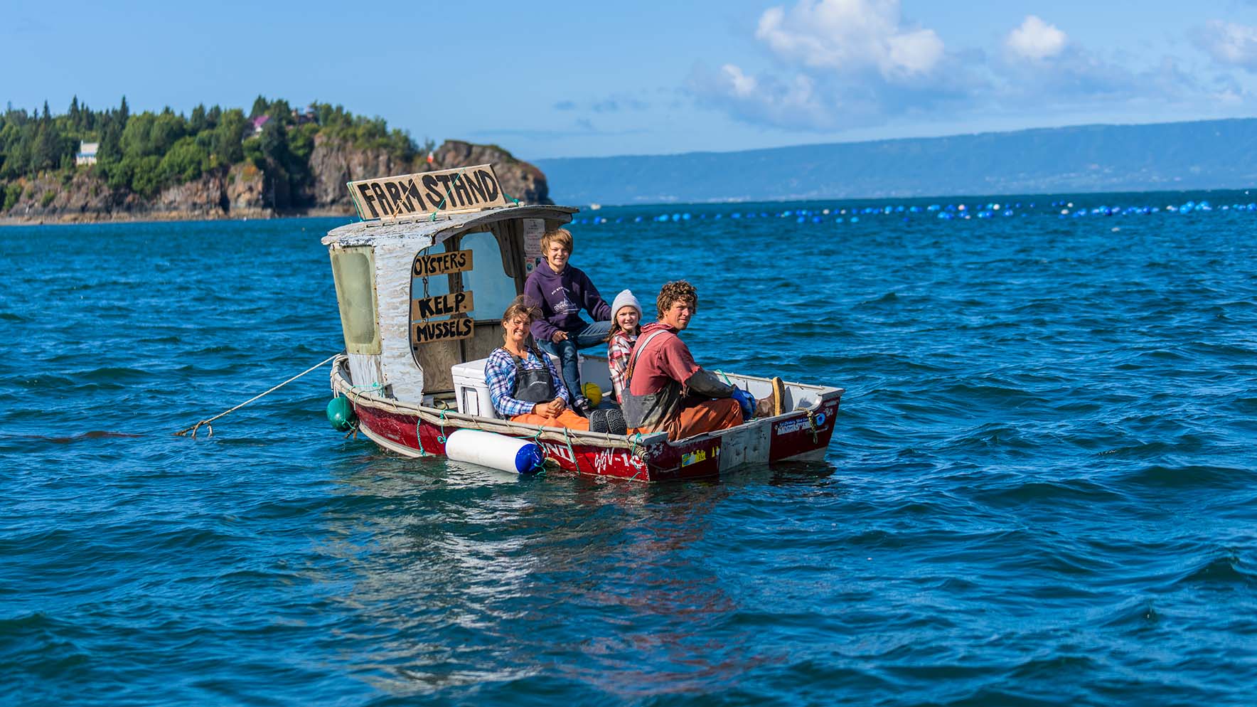 The Bates family on a small boat