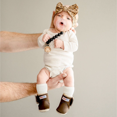 Little baby wearing little baby XTRATUFs