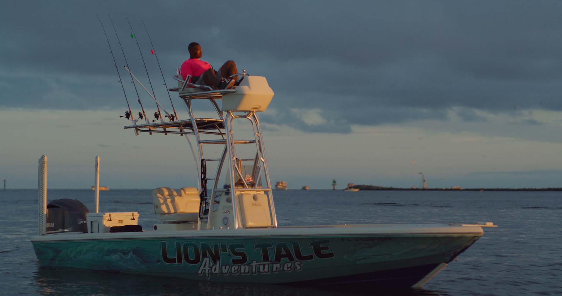 Lionel relaxing on a boat.