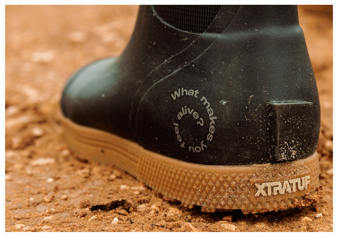 cotty boots with the words 'What makes you feel alive' on the boot. 