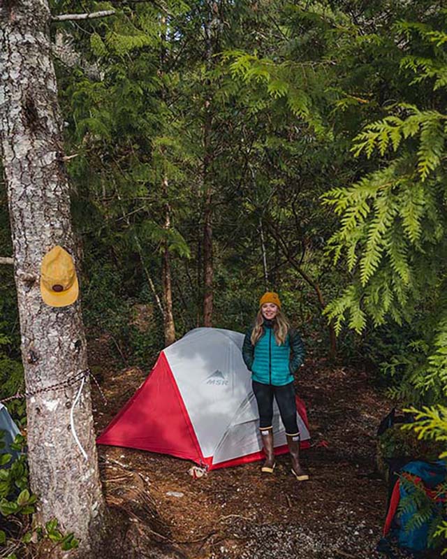 Errin standing next to finished tent