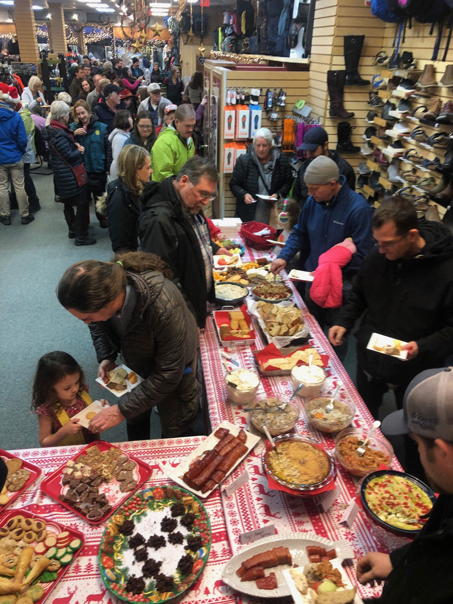 Community members going business to business and getting food