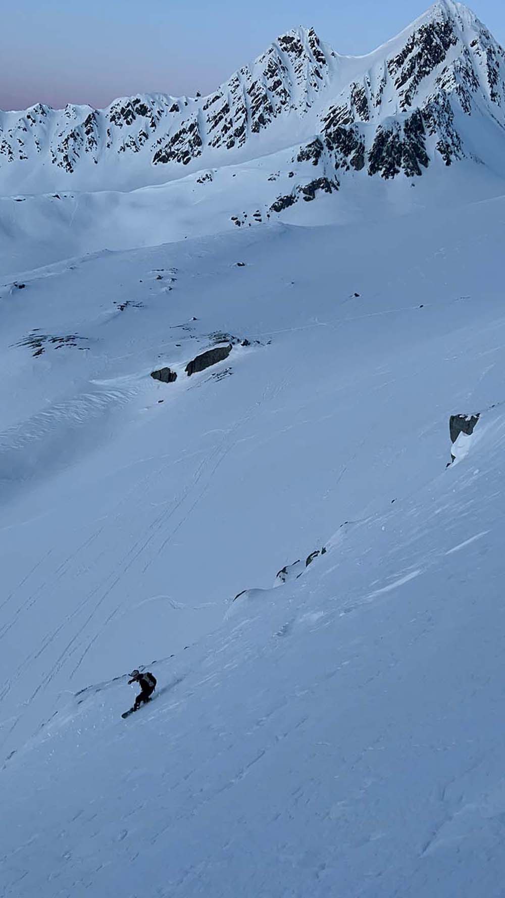 Carving some powder on the way down